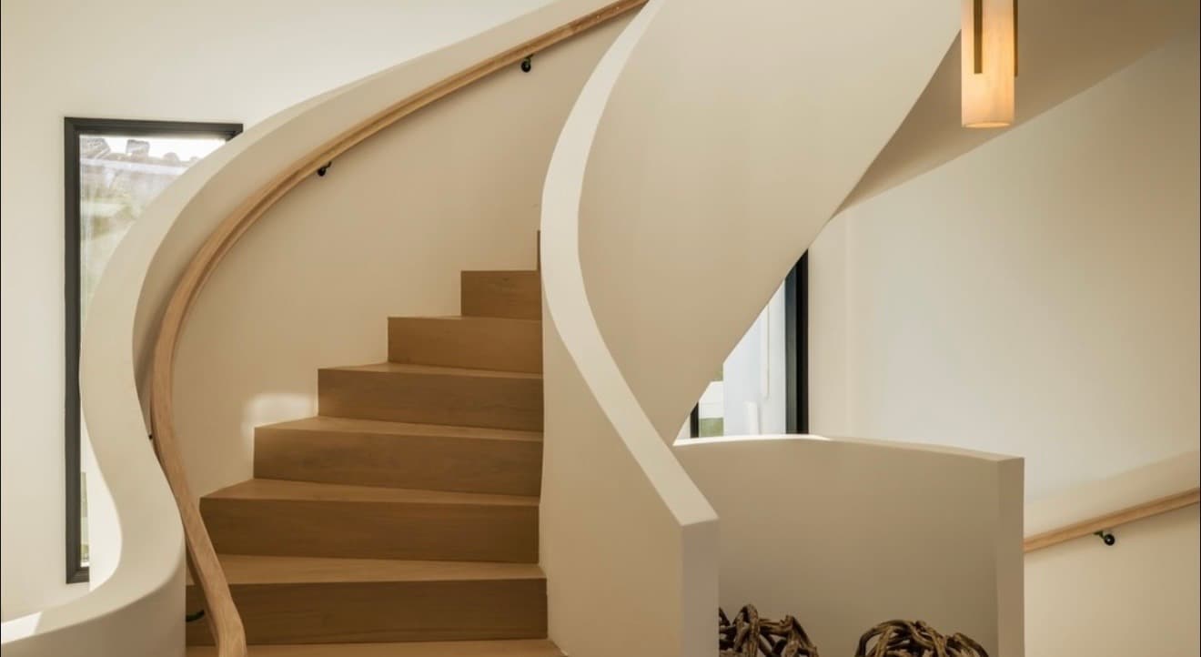 Sculptural staircase, custom architectural millwork