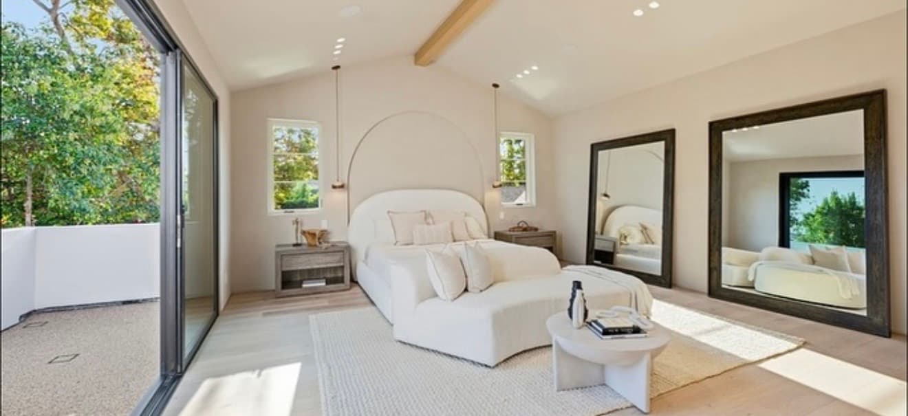 Primary suite with private balcony access